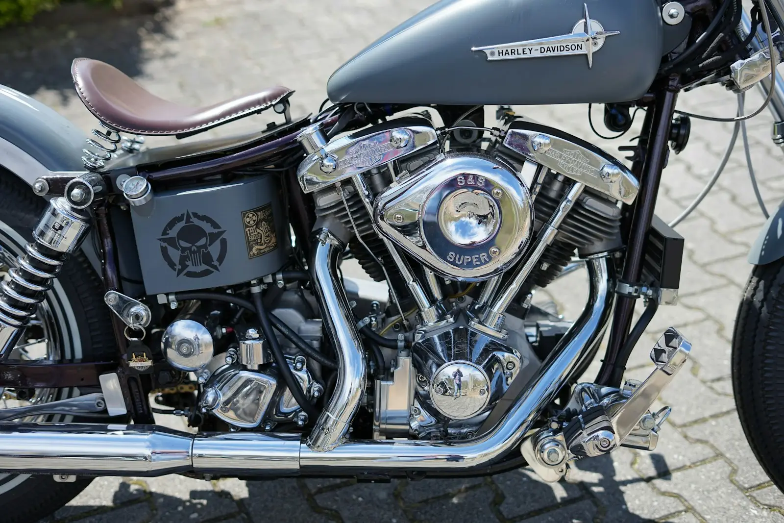 a close up of a motorcycle parked on a street